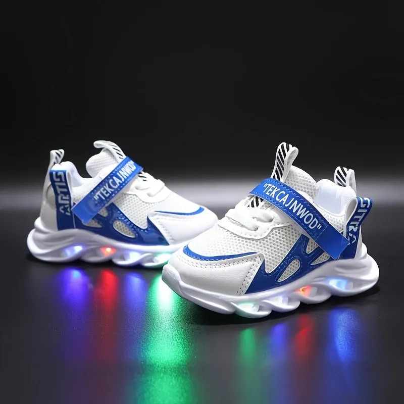 Boys and Unisex Kids LED Flashing Sneakers with Adjustable Strap, Breathable Mesh Upper, PVC Sole, Fabric Insole and Interior, Geometric Pattern, Ages 14 and Under, Includes Disposable Button Battery, Safe Low Voltage Operation