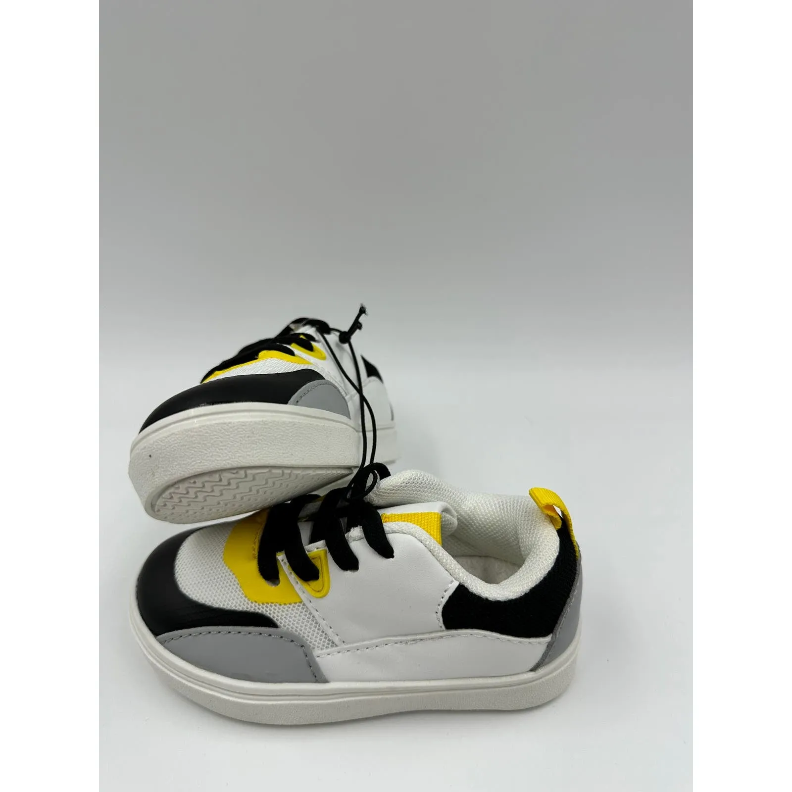 Small Kid Size 7, White Fashion Sneaker with Black, Gray & Yellow Accents